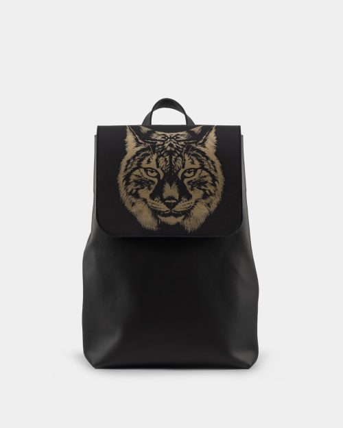 A black leather backpack decorated with lynh